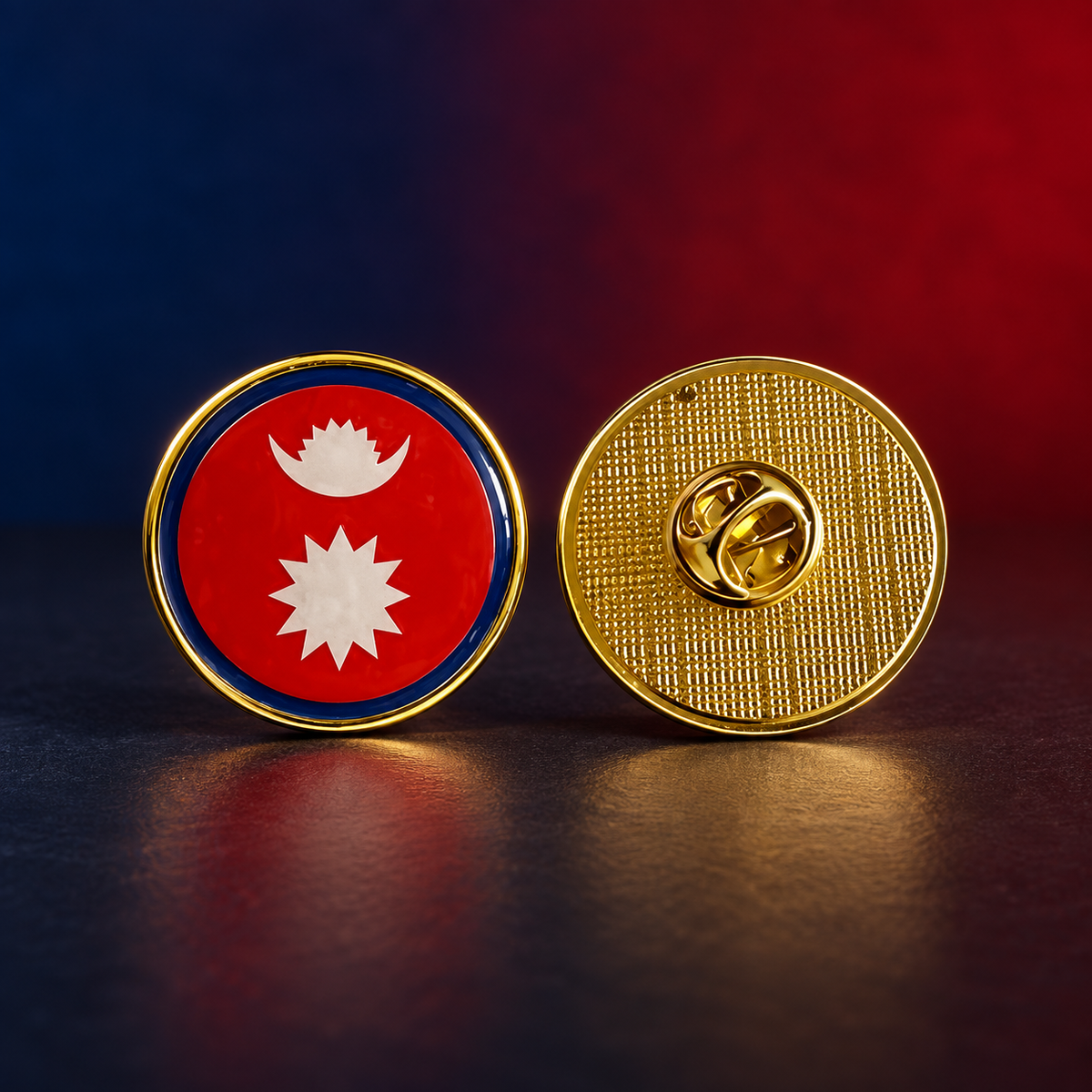 Two round Nepal flag lapel pins with gold-plated edges, one showing the front with the red, white, and blue flag design, and the other showing the textured gold back with a pin clasp.