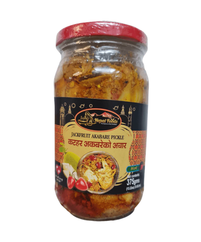 Jar of Jackfruit Akahare Pickle with a red lid on a white background