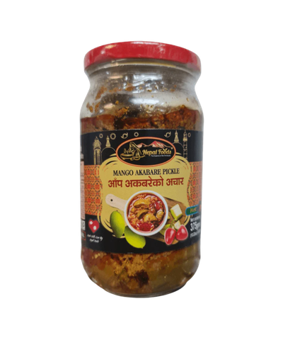 Jar of Mango Akabare Pickle with a colorful label on a white background
